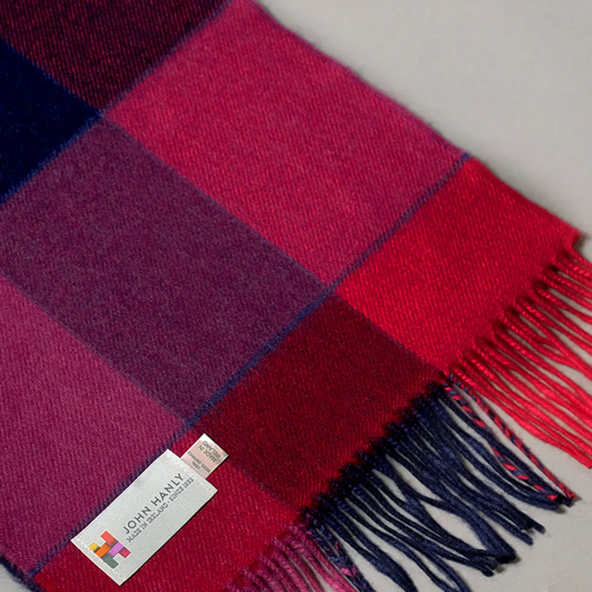 Pure merino wool scarf in red navy and fuchsia block check